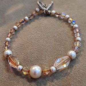 Touchstone Crystal made with Swarovski crystals and pearls